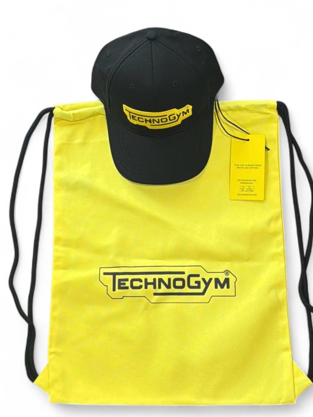 Technogym set: black cap with yellow logo and drawstring bag